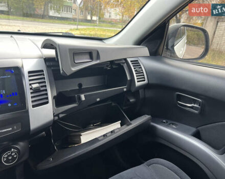 Білий Міцубісі Аутлендер, об'ємом двигуна 2.36 л та пробігом 260 тис. км за 9700 $, фото 13 на Automoto.ua