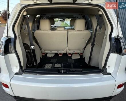 Белый Мицубиси Аутлендер, объемом двигателя 3 л и пробегом 269 тыс. км за 10500 $, фото 72 на Automoto.ua