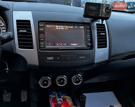 Белый Мицубиси Аутлендер, объемом двигателя 2.3 л и пробегом 161 тыс. км за 11150 $, фото 25 на Automoto.ua