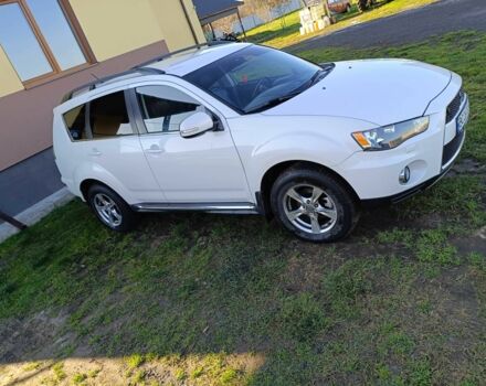 Белый Мицубиси Аутлендер, объемом двигателя 2.2 л и пробегом 232 тыс. км за 11100 $, фото 1 на Automoto.ua