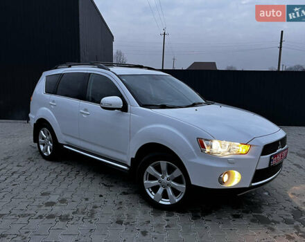 Белый Мицубиси Аутлендер, объемом двигателя 2.3 л и пробегом 161 тыс. км за 11150 $, фото 54 на Automoto.ua
