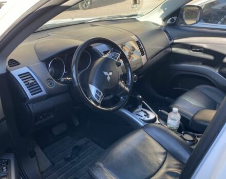 Белый Мицубиси Аутлендер, объемом двигателя 2.4 л и пробегом 154 тыс. км за 12500 $, фото 13 на Automoto.ua