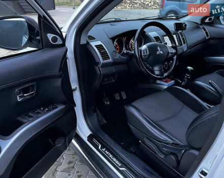 Белый Мицубиси Аутлендер, объемом двигателя 2.3 л и пробегом 161 тыс. км за 11150 $, фото 21 на Automoto.ua