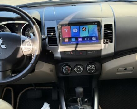 Белый Мицубиси Аутлендер, объемом двигателя 2.4 л и пробегом 223 тыс. км за 10500 $, фото 7 на Automoto.ua