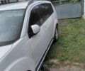 Білий Міцубісі Аутлендер, об'ємом двигуна 2.3 л та пробігом 288 тис. км за 12000 $, фото 1 на Automoto.ua
