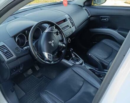 Белый Мицубиси Аутлендер, объемом двигателя 2.2 л и пробегом 232 тыс. км за 10950 $, фото 20 на Automoto.ua