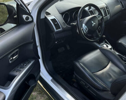 Белый Мицубиси Аутлендер, объемом двигателя 2.4 л и пробегом 170 тыс. км за 14500 $, фото 7 на Automoto.ua