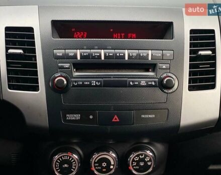 Білий Міцубісі Аутлендер, об'ємом двигуна 2 л та пробігом 248 тис. км за 10490 $, фото 28 на Automoto.ua