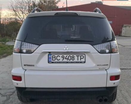Белый Мицубиси Аутлендер, объемом двигателя 2.27 л и пробегом 191 тыс. км за 10999 $, фото 3 на Automoto.ua
