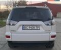 Белый Мицубиси Аутлендер, объемом двигателя 2.27 л и пробегом 191 тыс. км за 10999 $, фото 3 на Automoto.ua