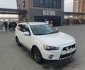 Білий Міцубісі Аутлендер, об'ємом двигуна 2.2 л та пробігом 194 тис. км за 8700 $, фото 1 на Automoto.ua