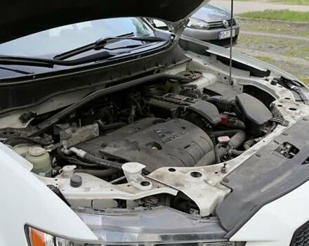 Белый Мицубиси Аутлендер, объемом двигателя 2 л и пробегом 172 тыс. км за 10999 $, фото 31 на Automoto.ua