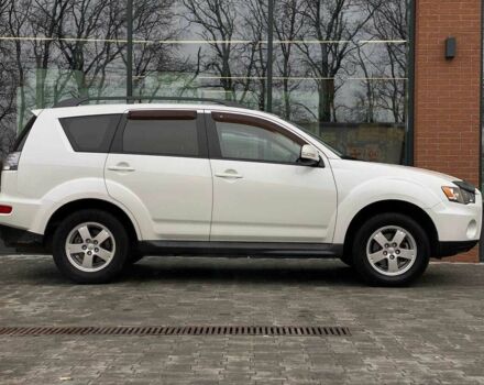 Белый Мицубиси Аутлендер, объемом двигателя 2 л и пробегом 248 тыс. км за 10490 $, фото 4 на Automoto.ua