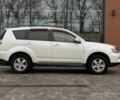 Белый Мицубиси Аутлендер, объемом двигателя 2 л и пробегом 248 тыс. км за 10490 $, фото 4 на Automoto.ua