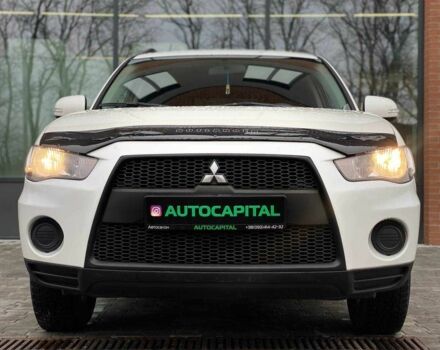 Белый Мицубиси Аутлендер, объемом двигателя 2 л и пробегом 248 тыс. км за 10490 $, фото 2 на Automoto.ua
