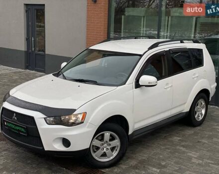 Білий Міцубісі Аутлендер, об'ємом двигуна 2 л та пробігом 248 тис. км за 10490 $, фото 1 на Automoto.ua