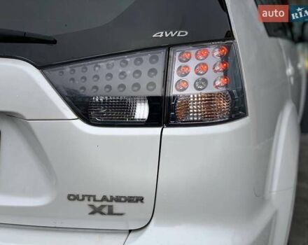 Білий Міцубісі Аутлендер, об'ємом двигуна 2 л та пробігом 248 тис. км за 10490 $, фото 13 на Automoto.ua