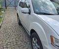 Білий Міцубісі Аутлендер, об'ємом двигуна 2.27 л та пробігом 206 тис. км за 9800 $, фото 1 на Automoto.ua