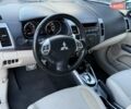 Белый Мицубиси Аутлендер, объемом двигателя 3 л и пробегом 269 тыс. км за 10500 $, фото 46 на Automoto.ua