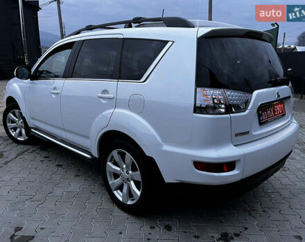 Белый Мицубиси Аутлендер, объемом двигателя 2.3 л и пробегом 161 тыс. км за 11150 $, фото 20 на Automoto.ua