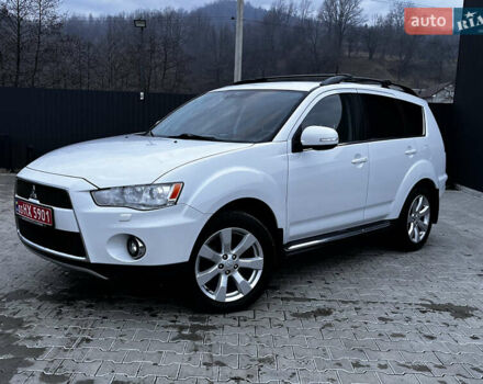 Белый Мицубиси Аутлендер, объемом двигателя 2.3 л и пробегом 161 тыс. км за 11150 $, фото 2 на Automoto.ua