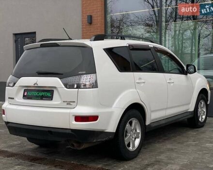 Білий Міцубісі Аутлендер, об'ємом двигуна 2 л та пробігом 248 тис. км за 10490 $, фото 11 на Automoto.ua