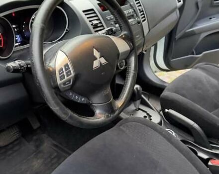 Белый Мицубиси Аутлендер, объемом двигателя 2 л и пробегом 172 тыс. км за 10999 $, фото 22 на Automoto.ua