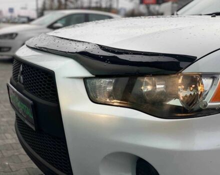 Белый Мицубиси Аутлендер, объемом двигателя 2 л и пробегом 248 тыс. км за 10490 $, фото 10 на Automoto.ua