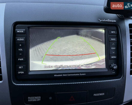 Белый Мицубиси Аутлендер, объемом двигателя 2.3 л и пробегом 161 тыс. км за 11150 $, фото 39 на Automoto.ua