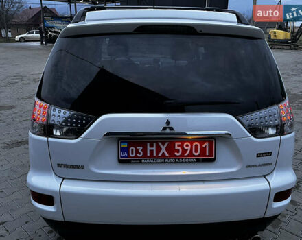 Белый Мицубиси Аутлендер, объемом двигателя 2.3 л и пробегом 161 тыс. км за 11150 $, фото 15 на Automoto.ua
