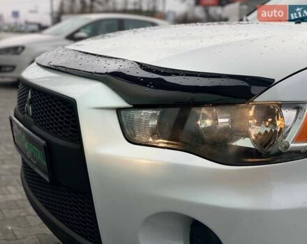 Білий Міцубісі Аутлендер, об'ємом двигуна 2 л та пробігом 248 тис. км за 10490 $, фото 14 на Automoto.ua