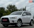 Белый Мицубиси Аутлендер, объемом двигателя 2.2 л и пробегом 122 тыс. км за 13490 $, фото 1 на Automoto.ua