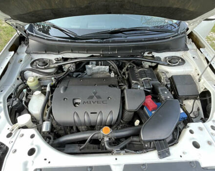 Белый Мицубиси Аутлендер, объемом двигателя 2.4 л и пробегом 170 тыс. км за 14500 $, фото 9 на Automoto.ua