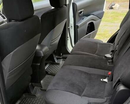 Белый Мицубиси Аутлендер, объемом двигателя 2 л и пробегом 172 тыс. км за 10999 $, фото 27 на Automoto.ua