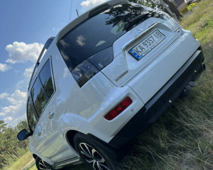 Белый Мицубиси Аутлендер, объемом двигателя 2.4 л и пробегом 170 тыс. км за 14500 $, фото 4 на Automoto.ua