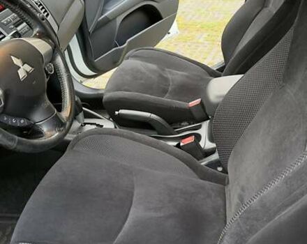 Белый Мицубиси Аутлендер, объемом двигателя 2 л и пробегом 172 тыс. км за 10999 $, фото 20 на Automoto.ua