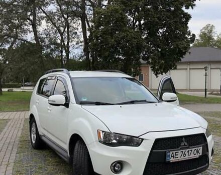 Белый Мицубиси Аутлендер, объемом двигателя 2 л и пробегом 172 тыс. км за 10999 $, фото 1 на Automoto.ua