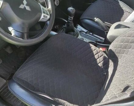 Білий Міцубісі Аутлендер, об'ємом двигуна 2.3 л та пробігом 288 тис. км за 12000 $, фото 11 на Automoto.ua