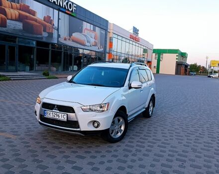 Белый Мицубиси Аутлендер, объемом двигателя 2.4 л и пробегом 187 тыс. км за 9700 $, фото 1 на Automoto.ua