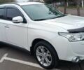 Білий Міцубісі Аутлендер, об'ємом двигуна 2.4 л та пробігом 112 тис. км за 15000 $, фото 1 на Automoto.ua