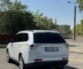 Белый Мицубиси Аутлендер, объемом двигателя 2 л и пробегом 174 тыс. км за 12999 $, фото 3 на Automoto.ua