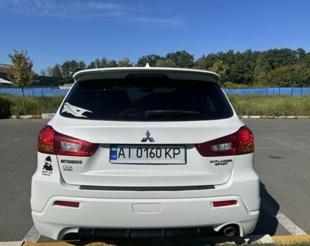 Білий Міцубісі Аутлендер, об'ємом двигуна 2 л та пробігом 260 тис. км за 9500 $, фото 1 на Automoto.ua