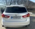 Белый Мицубиси Аутлендер, объемом двигателя 2 л и пробегом 140 тыс. км за 10600 $, фото 9 на Automoto.ua