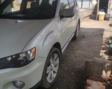 Белый Мицубиси Аутлендер, объемом двигателя 2.36 л и пробегом 113 тыс. км за 12500 $, фото 4 на Automoto.ua