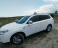 Білий Міцубісі Аутлендер, об'ємом двигуна 2.3 л та пробігом 228 тис. км за 12000 $, фото 2 на Automoto.ua