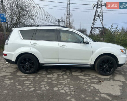 Белый Мицубиси Аутлендер, объемом двигателя 2.2 л и пробегом 226 тыс. км за 10999 $, фото 3 на Automoto.ua