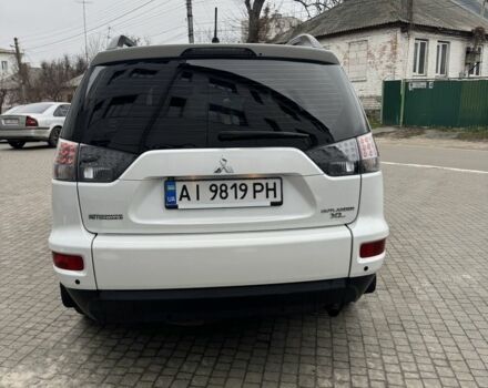 Білий Міцубісі Аутлендер, об'ємом двигуна 2.4 л та пробігом 174 тис. км за 12500 $, фото 3 на Automoto.ua