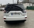 Білий Міцубісі Аутлендер, об'ємом двигуна 2.4 л та пробігом 174 тис. км за 12500 $, фото 3 на Automoto.ua