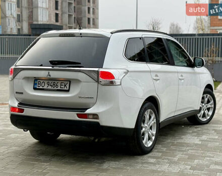 Белый Мицубиси Аутлендер, объемом двигателя 2.27 л и пробегом 264 тыс. км за 13500 $, фото 24 на Automoto.ua
