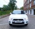 Белый Мицубиси Аутлендер, объемом двигателя 2.4 л и пробегом 180 тыс. км за 9900 $, фото 1 на Automoto.ua